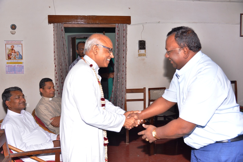 Rev Fr G P Amalraj – Dy Secretary NERBC, CCBI felicitates Bishop Raphy Manjaly